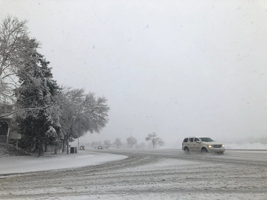 By late morning, snow was coming down hard along South Broadway in Highlands Ranch.
